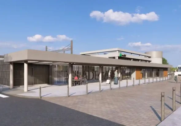 Infografía arquitectónica digital que muestra el exterior moderno y remodelado de la estación de tren de Viladecans (Adif), con accesos peatonales, marquesina gris, personas caminando y un ciclista en un día despejado.